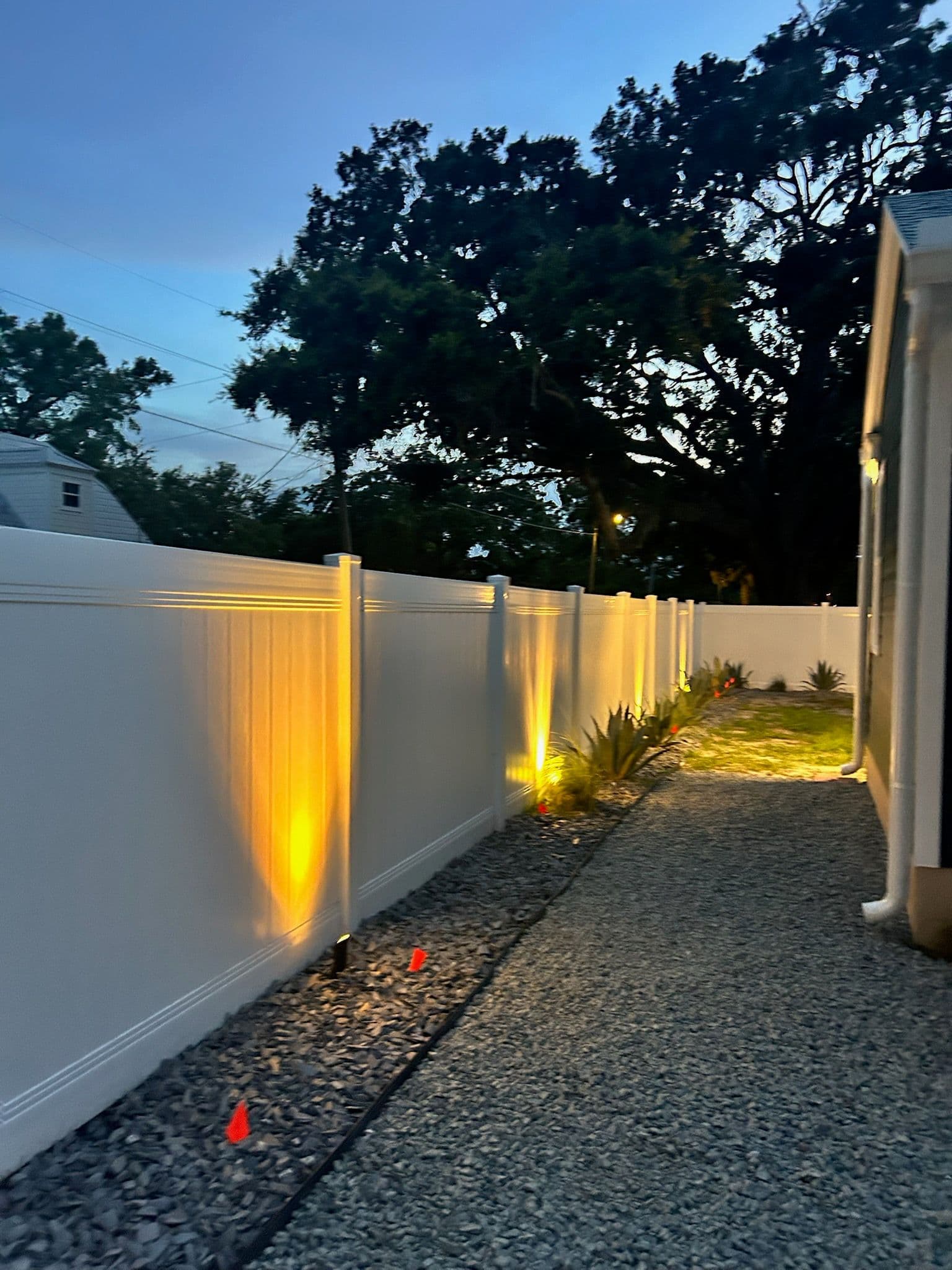 Enchanting Pathway Lighting in Winter Garden image